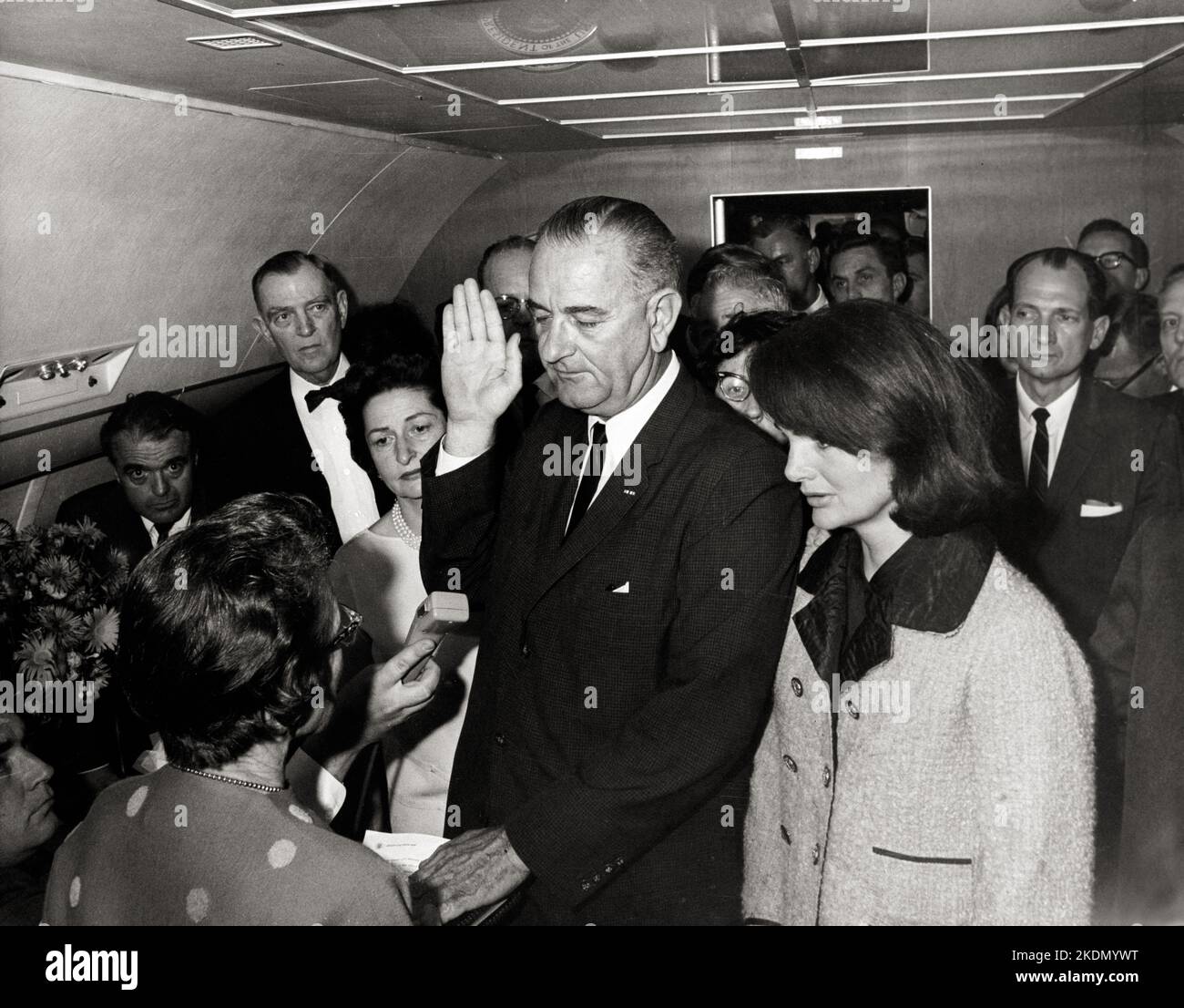 Lyndon B. Johnson taking the oath of office aboard Air Force One at Dallas Love Field, following the assassination of President John F. Kennedy earlier that day, November 22 1963 Stock Photo