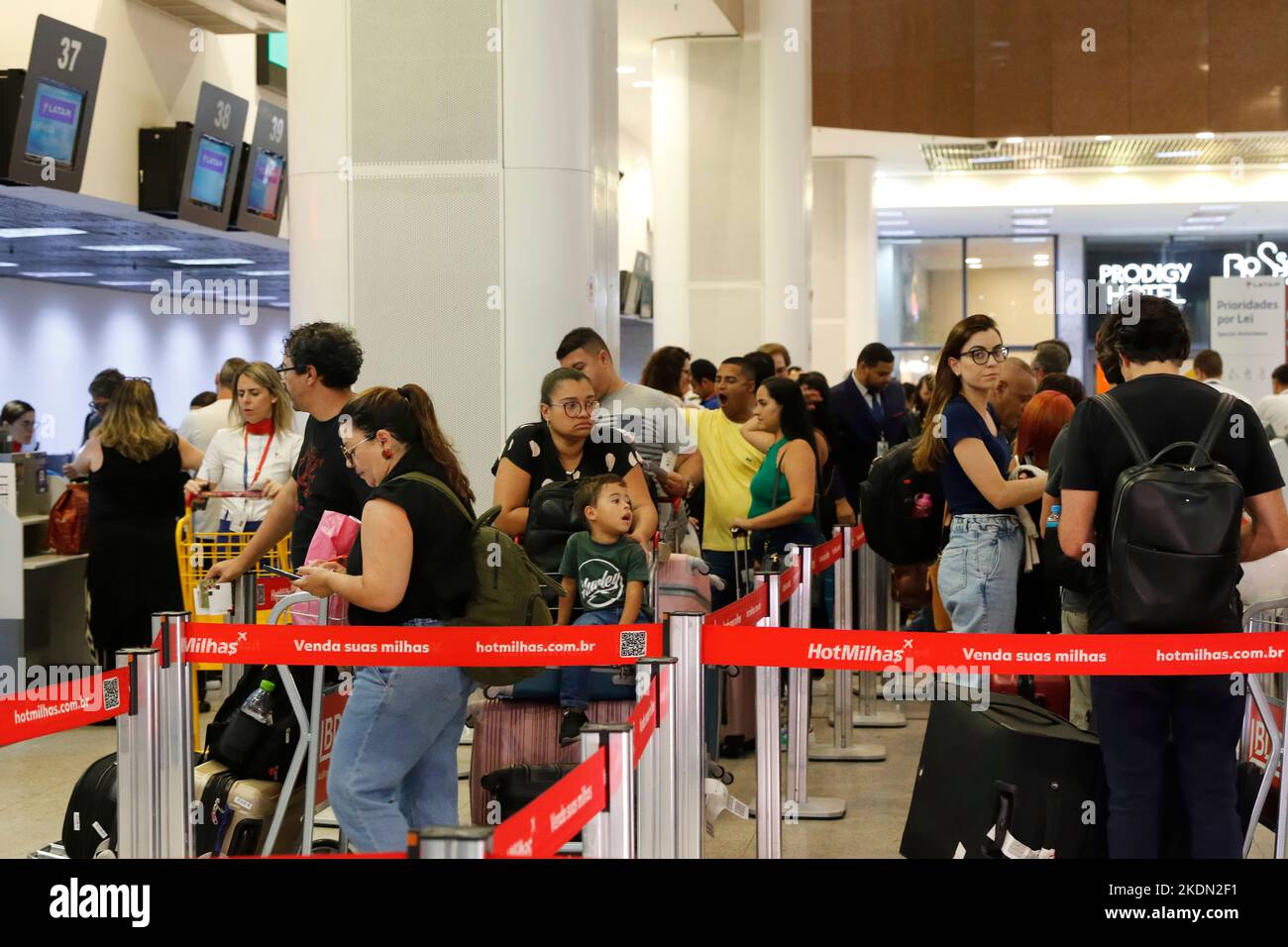 Santos Dumont Airport passengers in line at the boarding counters. Travellers at airport lobby, baggage drop area Stock Photo