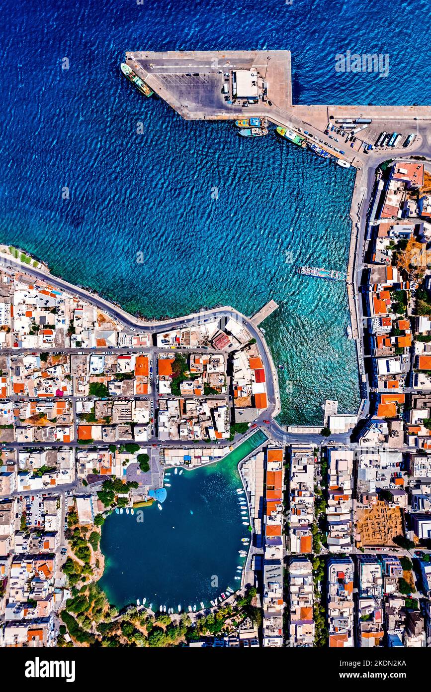 Aerial view of Agios Nikolaos town and Voulismeni lake, Lasithi, Crete island, Greece. Stock Photo