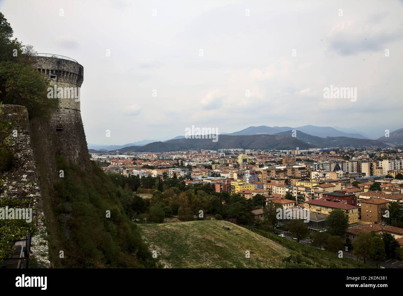 City seen from above framed by a castle built on a cliff on a cloudy day Stock Photo