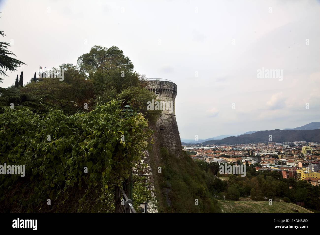 City seen from above framed by a castle built on a cliff on a cloudy day Stock Photo