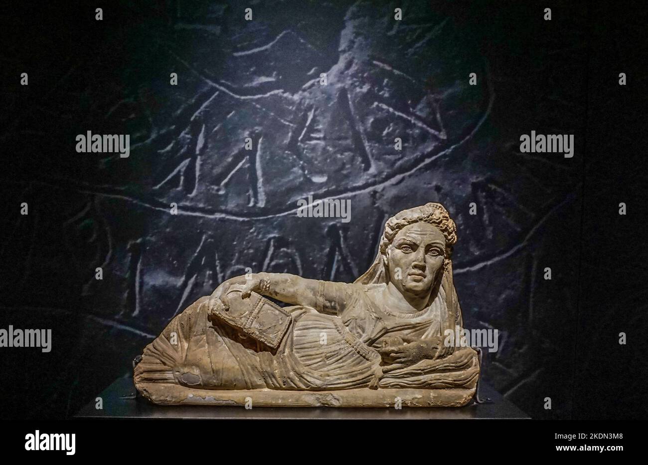 Etruscan funeral urn of a deceased woman on display in the Museum of Roman History, Nimes France. Stock Photo
