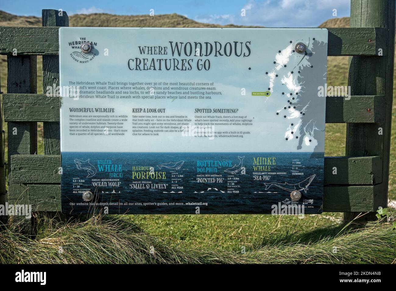 Where Wondrous Creatures Go, an information board  on The Hebridean Whale Trail at Eoligarry on the Isle of Barra, Outer Hebrides, Scotland, UK. Stock Photo