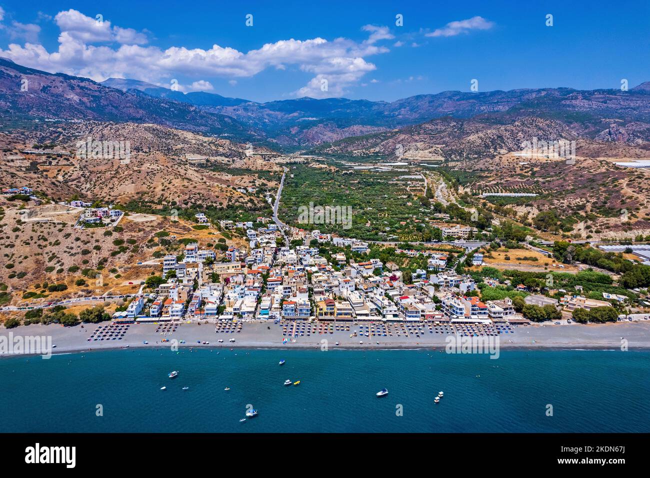 Aerial (drone) view of Myrtos (or 'Mirtos') village, municiaplity of Ierapetra, Lasithi prefecture, Crete island, Greece. Stock Photo