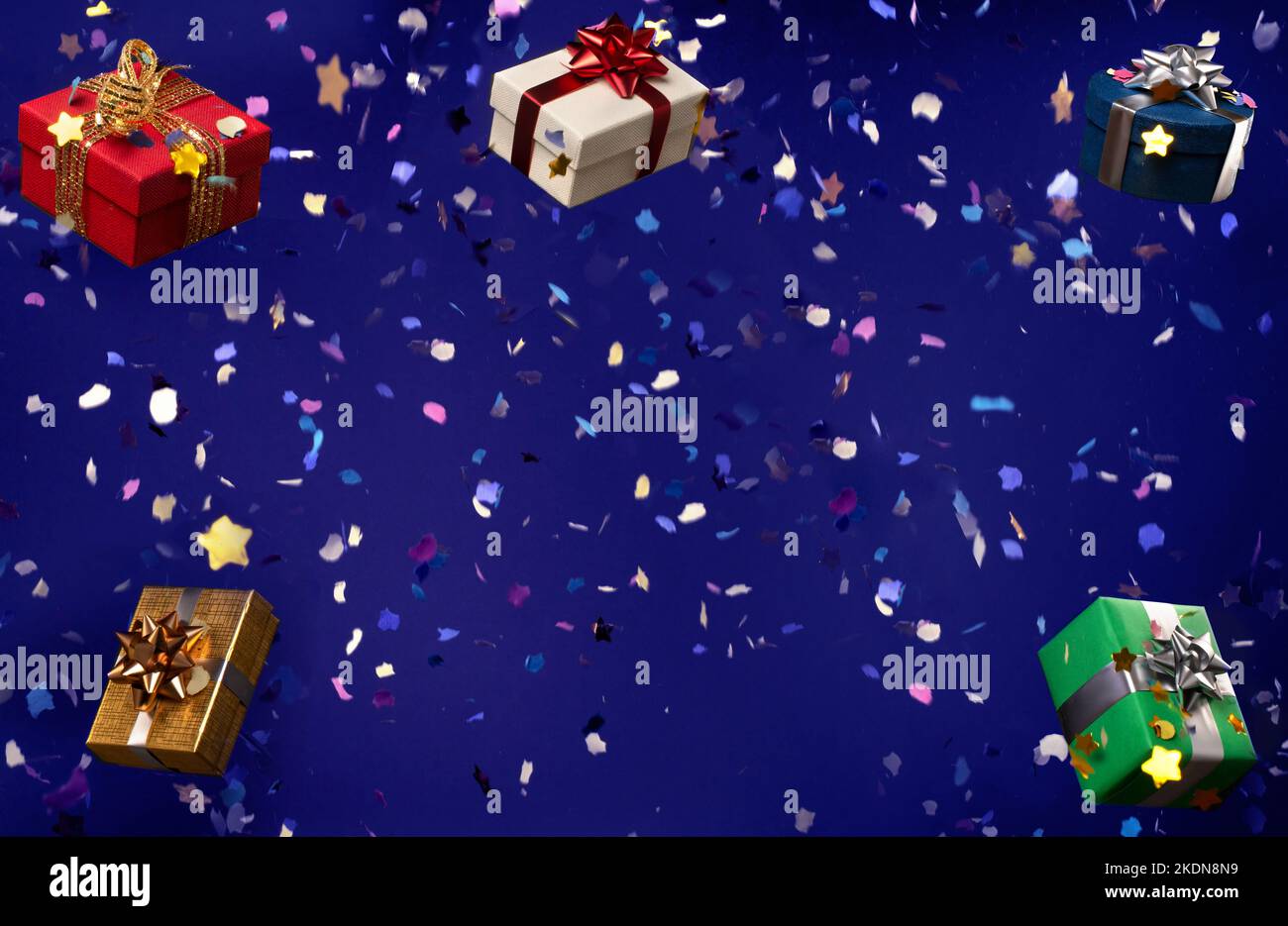 Blue background with gifts and falling confetti with copy space on ...