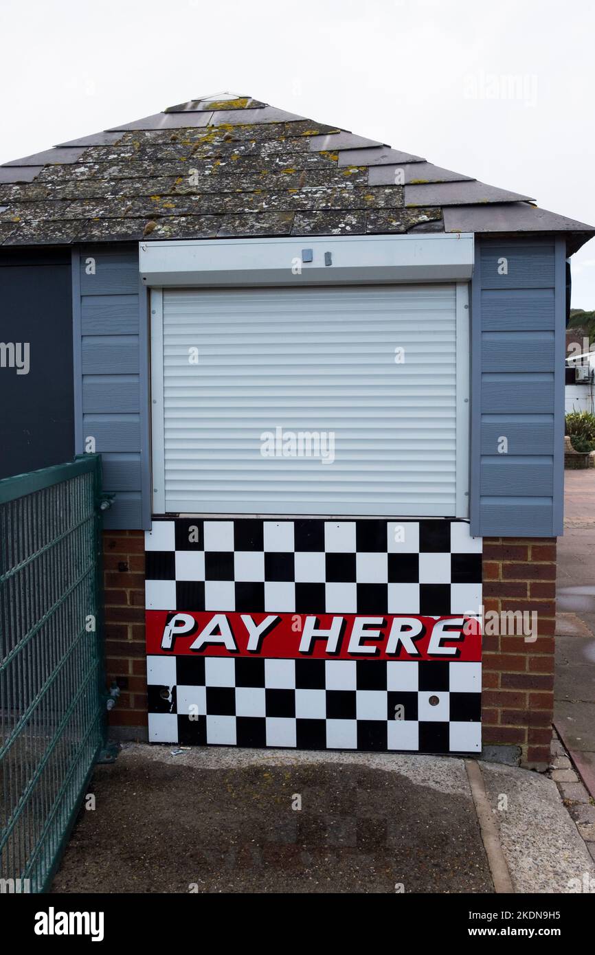 "Pay Here" closed pay kiosk for GoKarts on Hastings seafront, Stade