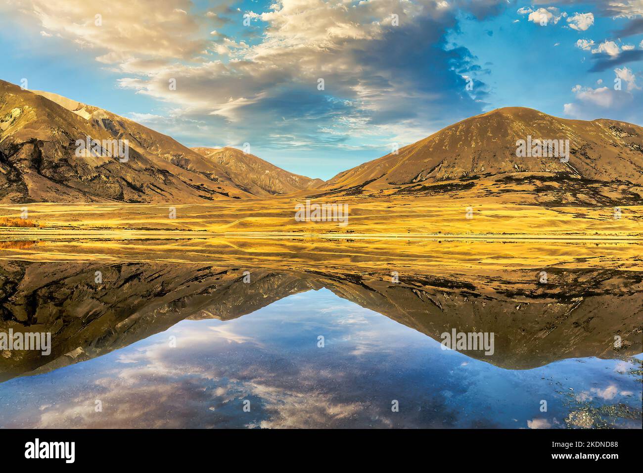 Stunning crystal clear mountain and sky reflections on the serene calm ...