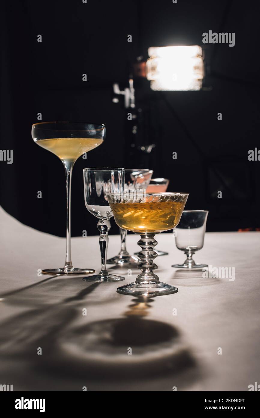 cocktail glass photoshoot behind the scenes in studio Stock Photo Alamy