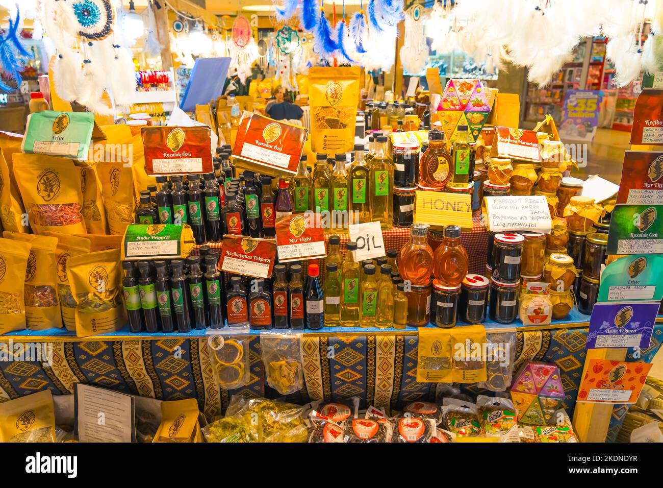 10.11.2022 - Side, Turkey - regional marketplace at shopping mall. counter full of oil bottles, honey and other different types of products. High quality photo Stock Photo