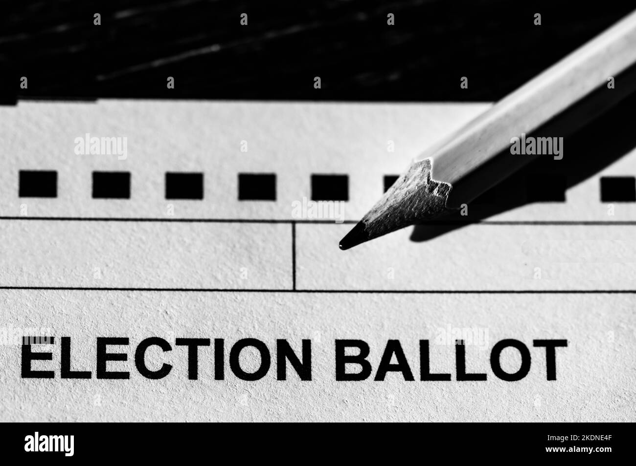 Selective focus on a generic election ballot with a pencil on top. Stock Photo