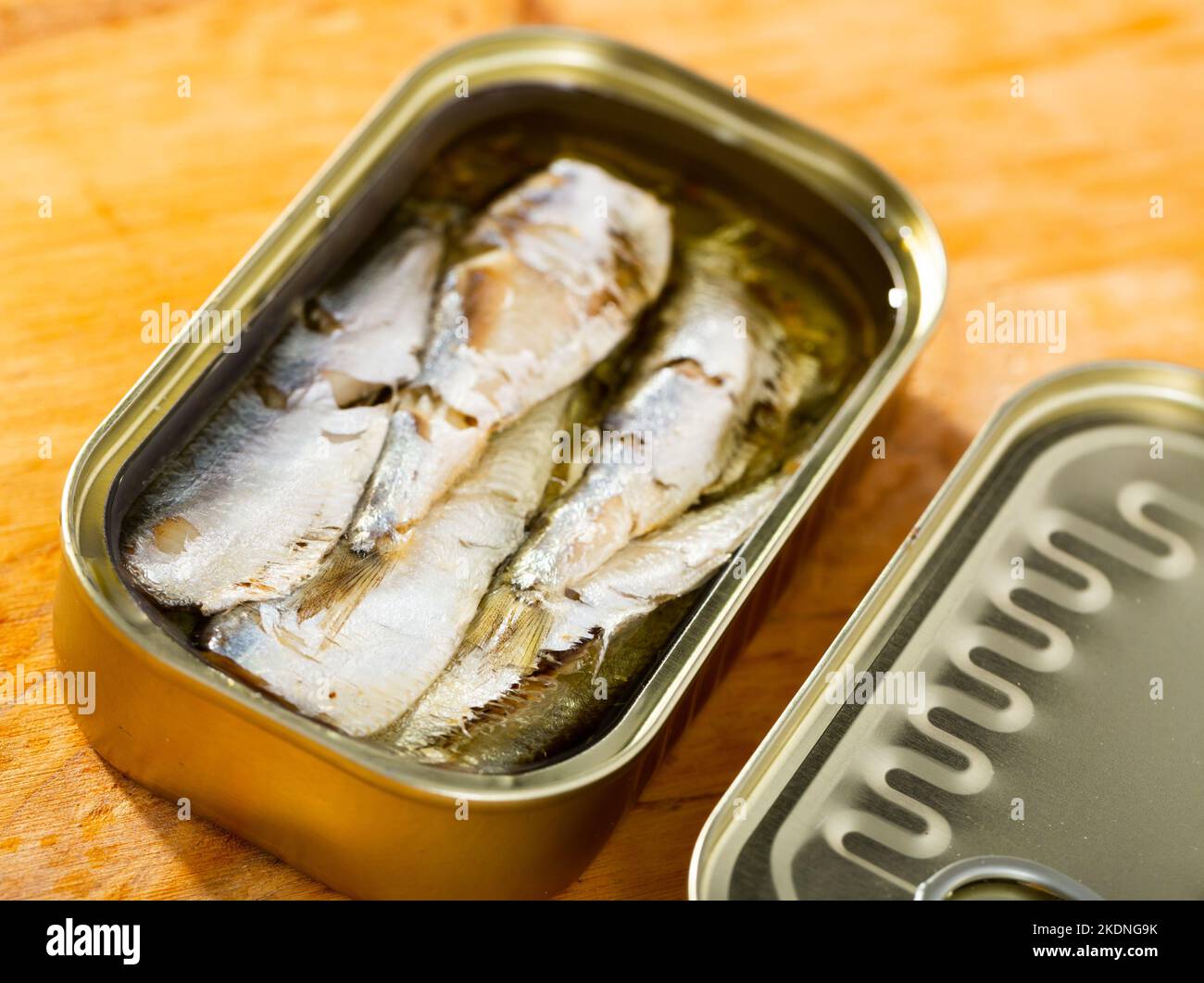 Open can of sardines in oil Stock Photo Alamy