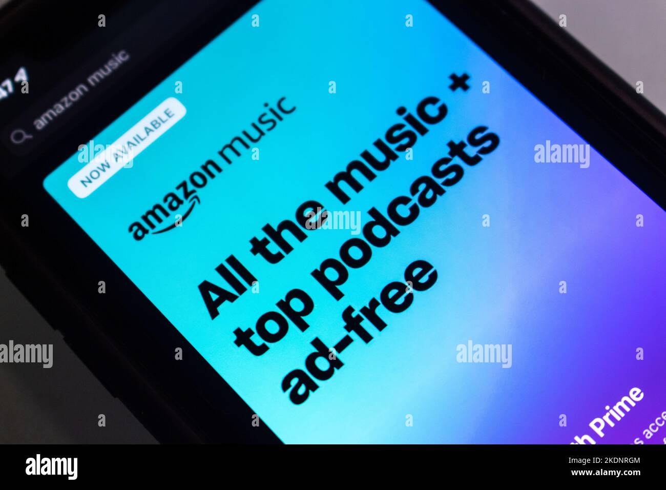 Ad of Amazon Music in App Store on an iPhone. Amazon announced that its upgrade of music catalog for Prime Members, but as a shuffle play only Stock Photo