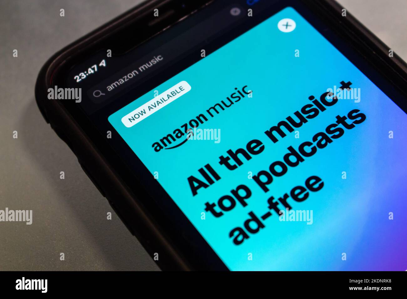 Ad of Amazon Music in App Store on an iPhone. Amazon announced that its upgrade of music catalog for Prime Members, but as a shuffle play only Stock Photo
