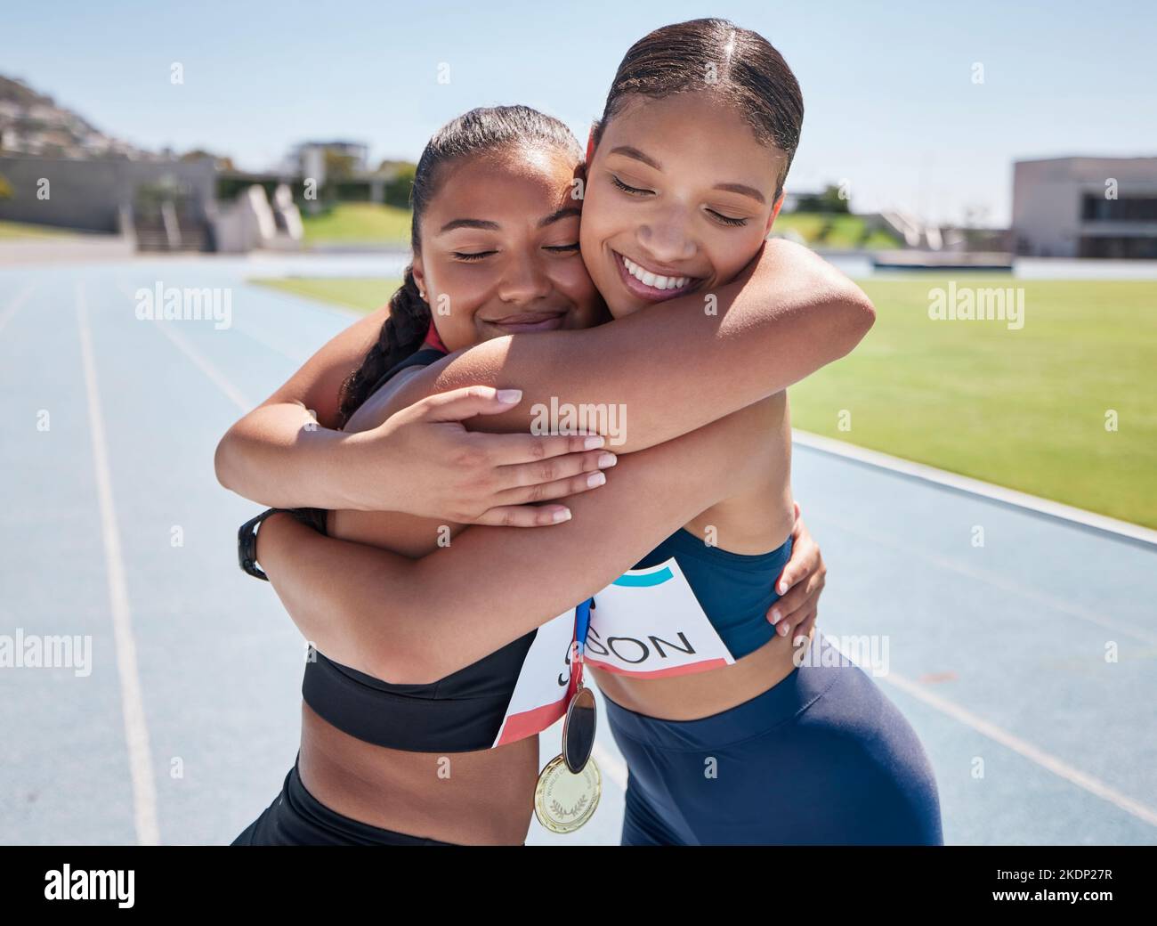Fitness, success and runner hug winner after marathon race on a running