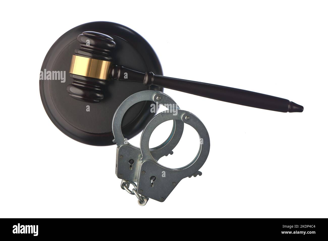 Judge's hammer and handcuffs on white isolated background Stock Photo