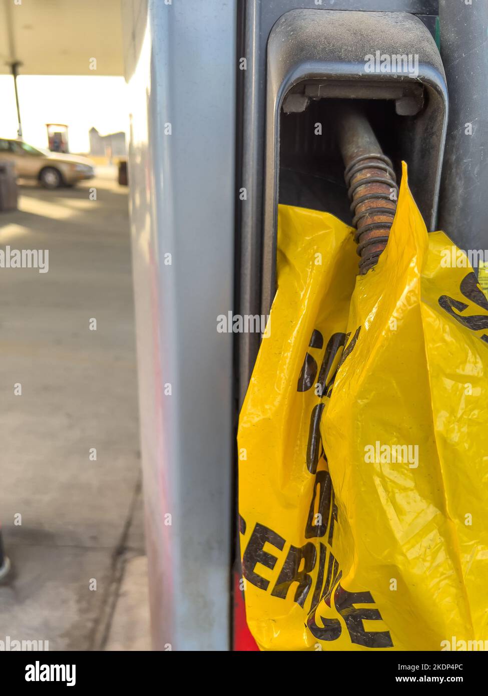 Bag with wording posting Out of Service over a gas station service