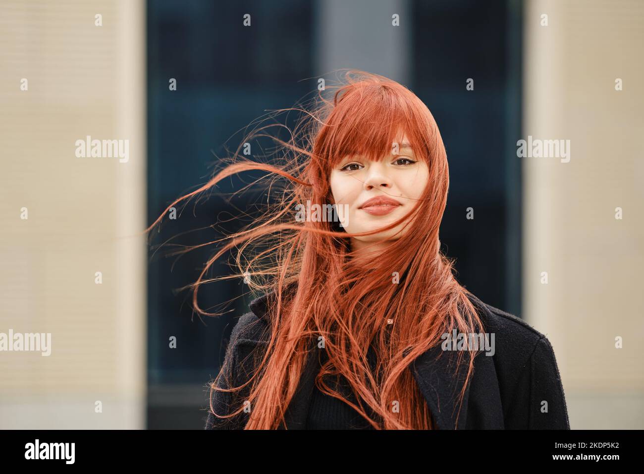 Red haired woman windy hi-res stock photography and images - Alamy