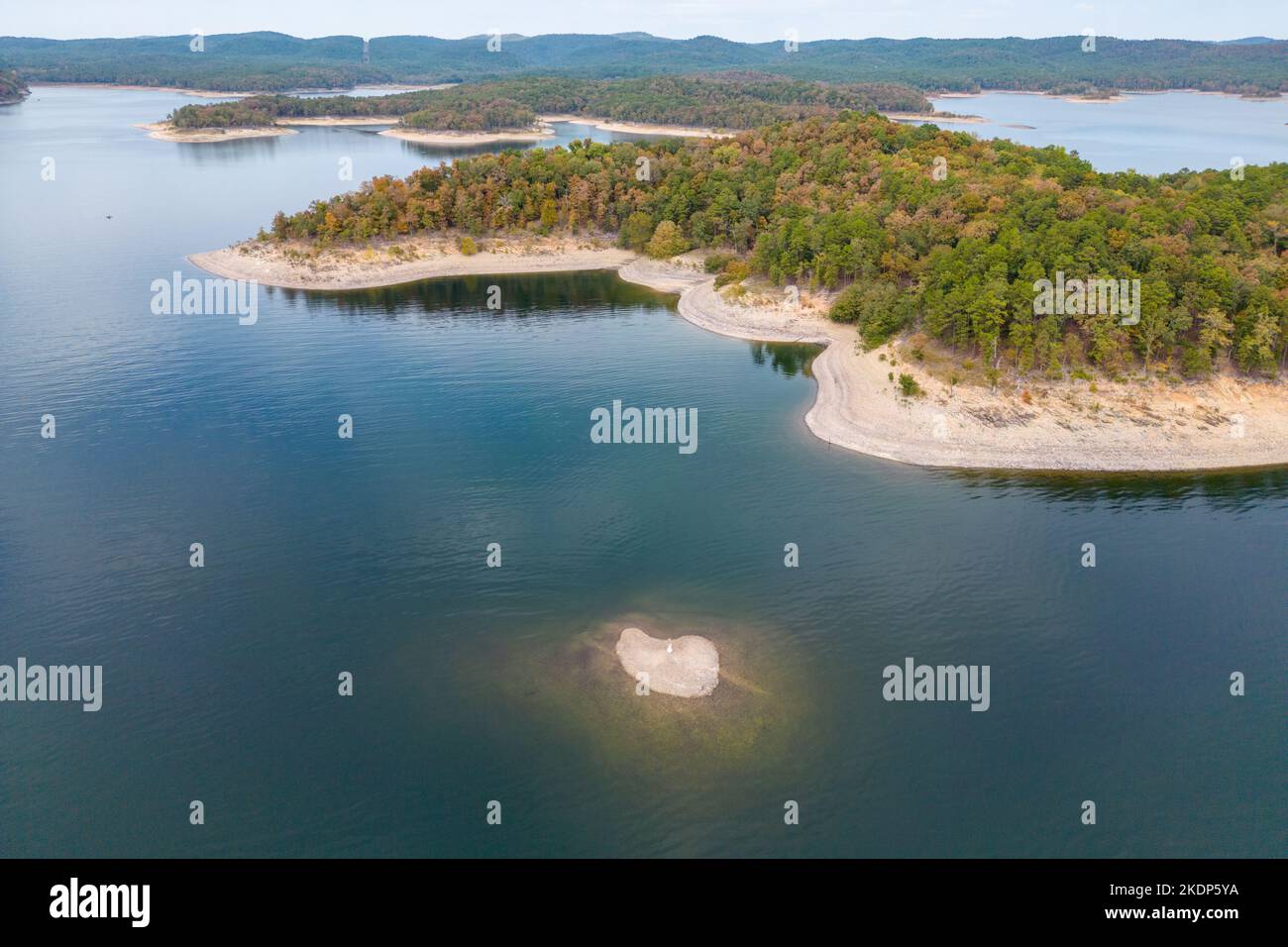 Aerial view of landscape of water of Broken Bow lake and islands with
