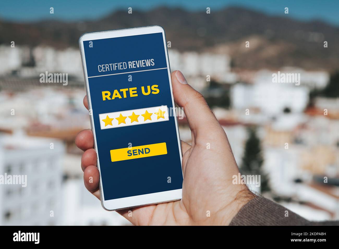 Product and service rating page in a mobile phone screen hold by man