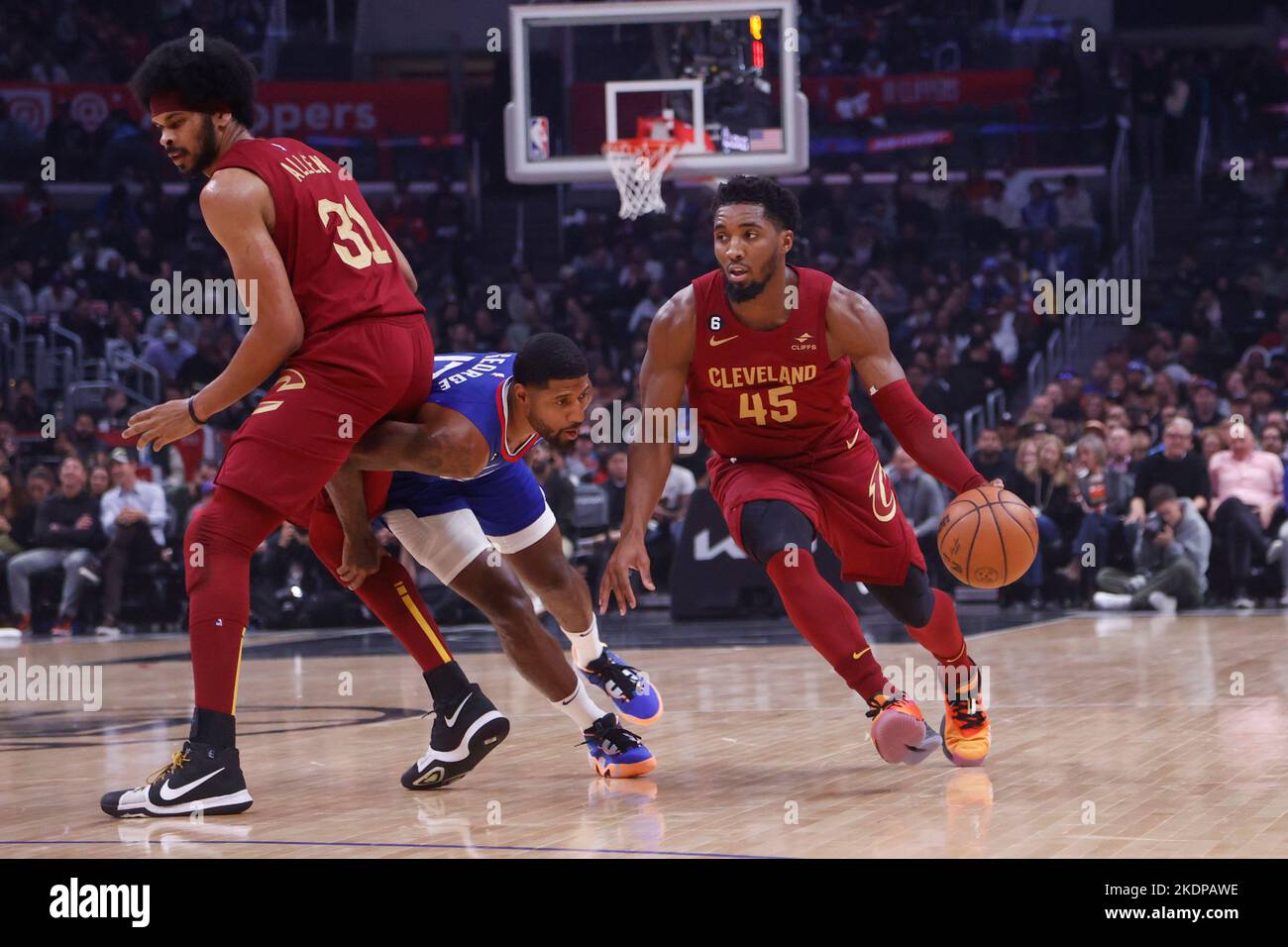 Los Angeles, California, USA. 7th Nov, 2022. Cleveland Cavaliers guard Donovan Mitchell (45) drives past Los Angeles Clippers forward Paul George (13) during an NBA basketball game Monday, November 7, 2022, in Los Angeles. (Credit Image: © Ringo Chiu/ZUMA Press Wire) Stock Photo