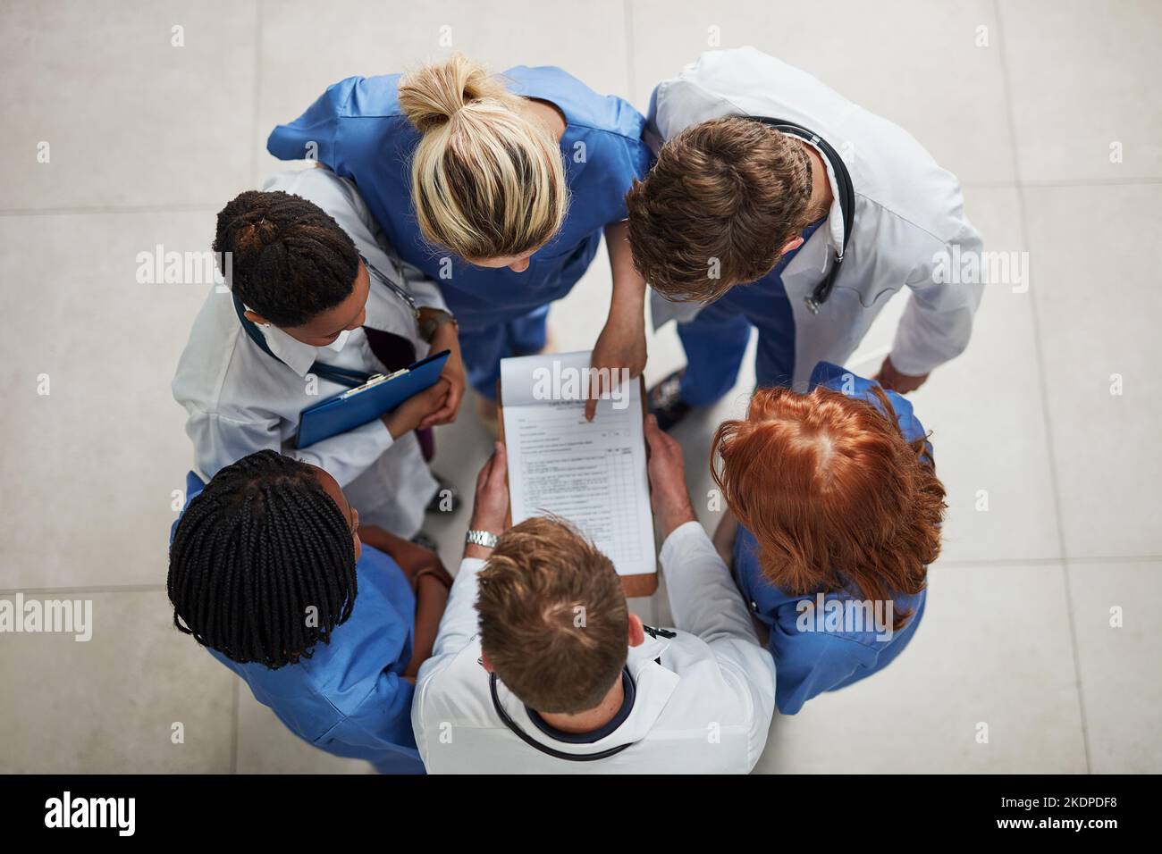 Medical team discussing notes hi-res stock photography and images - Alamy