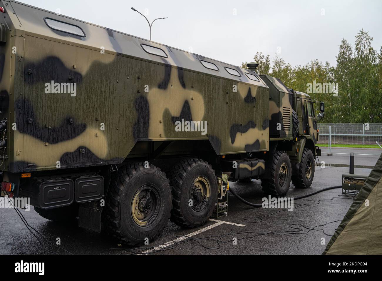 A mobile bathhouse for soldiers. Exterior view. Military equipment for participation in armed conflict.  Stock Photo
