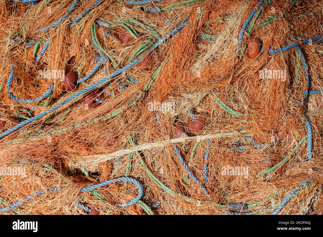 Fishing nets close up abstract background. Nylon fishing nets on a boat