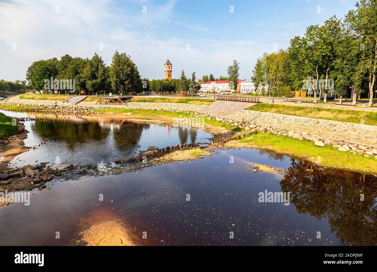 View of the old water tower and the embankment of the Polist river in Staraya Russa, Russia Stock Photo