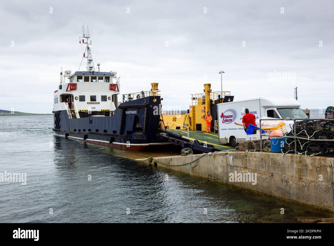 Passenger and vehicle ferry at an island port, Orkney Isands, UK, 2022