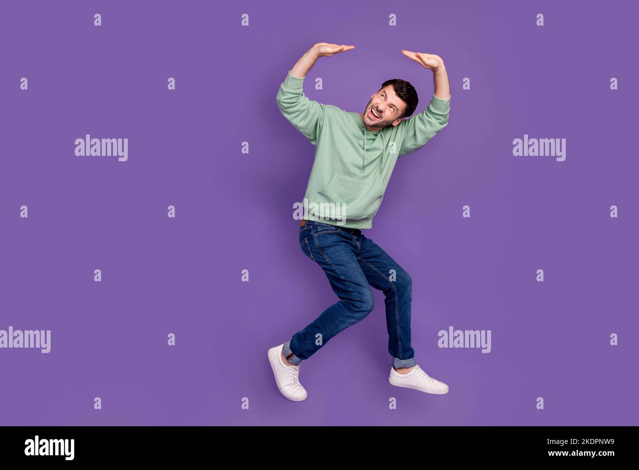 Full size photo of handsome young man hold heavy empty space stressed ...