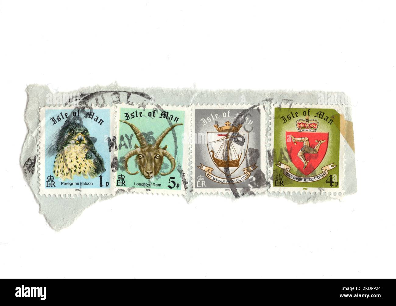 A montage of vintage postage stamps on paper from the United Kingdom