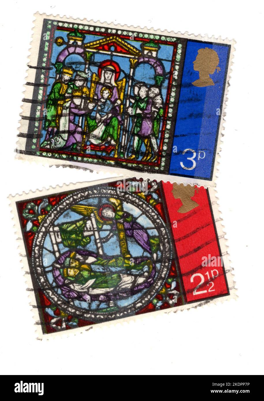 Vintage Christmas stamps from the United Kingdom on a white background. Stock Photo