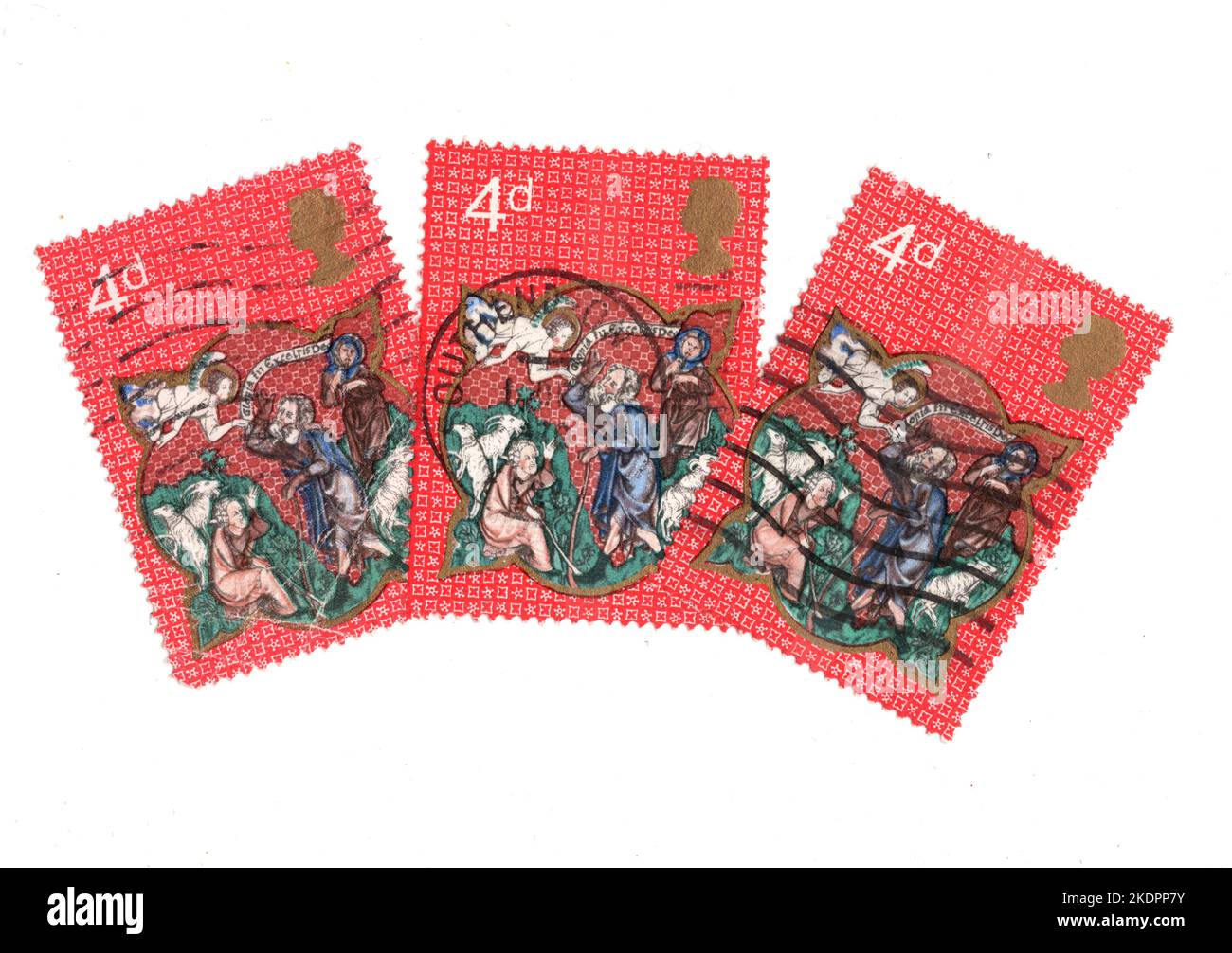 Vintage Christmas stamps from the United Kingdom on a white background. Stock Photo
