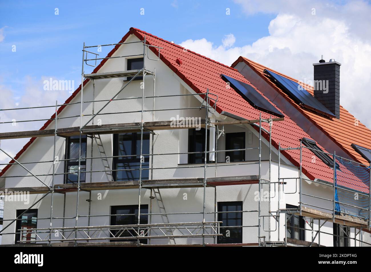 Scaffolding on a newly built detached house Stock Photo
