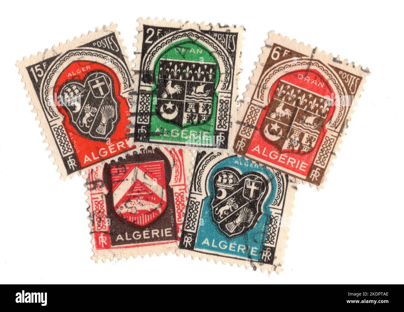 A montage of vintage postage stamps from Algeria on a white background ...