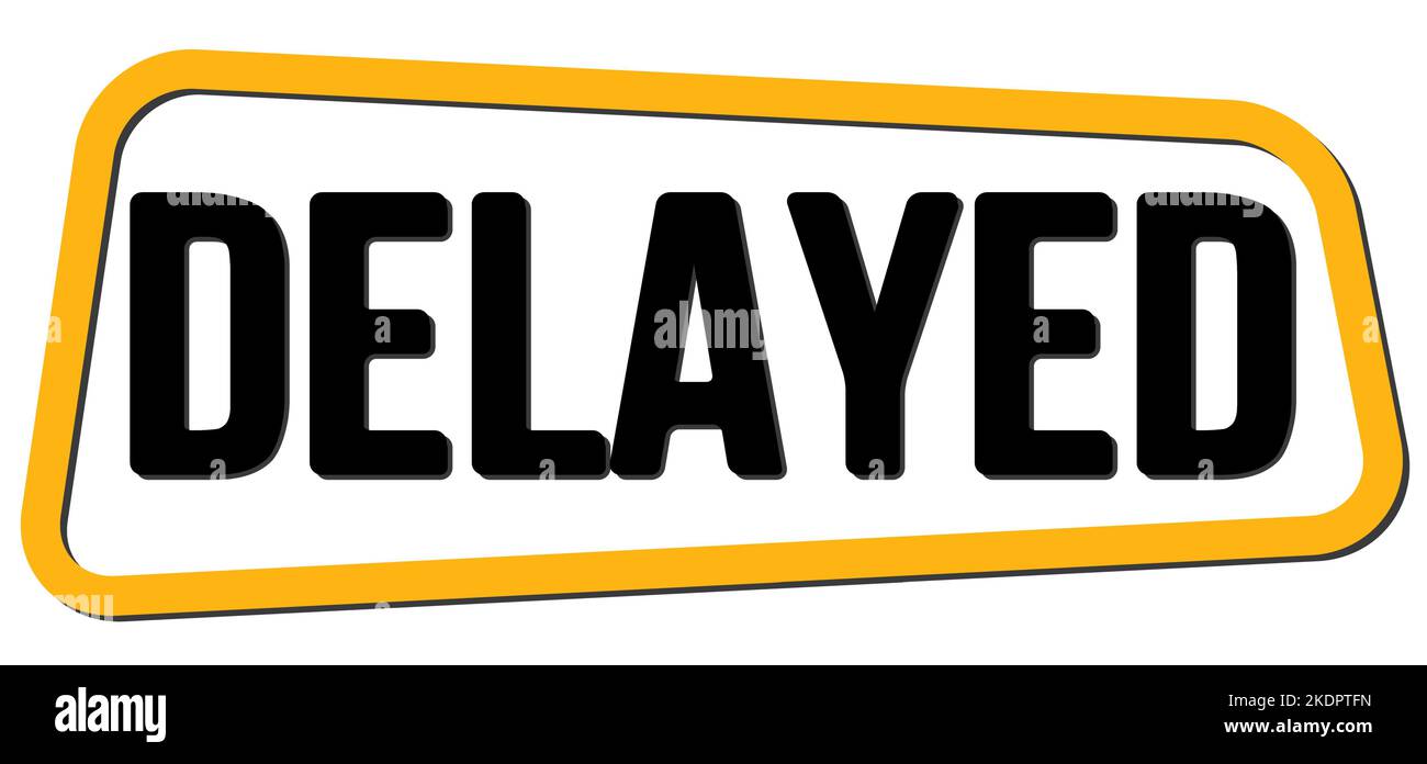 DELAYED text written on yellow-black trapeze stamp sign Stock Photo - Alamy