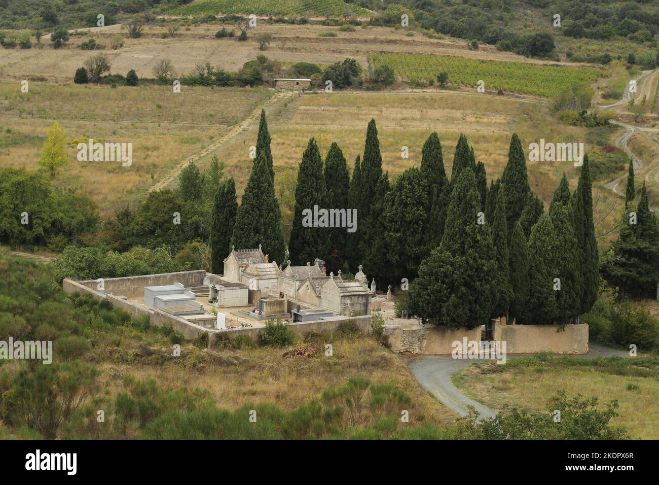 View of countryside featuring Cucugnan Cemetery in Aude Department, southern France Stock Photo