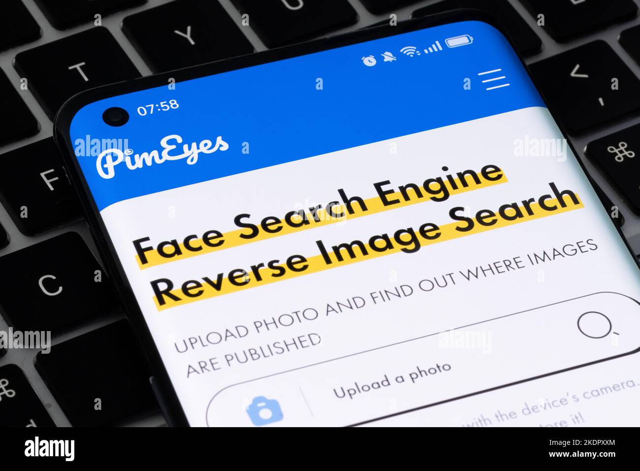 PimEyes face search engine page is seen on the smartphone. Stafford, United Kingdom, November 8, 2022 Stock Photo