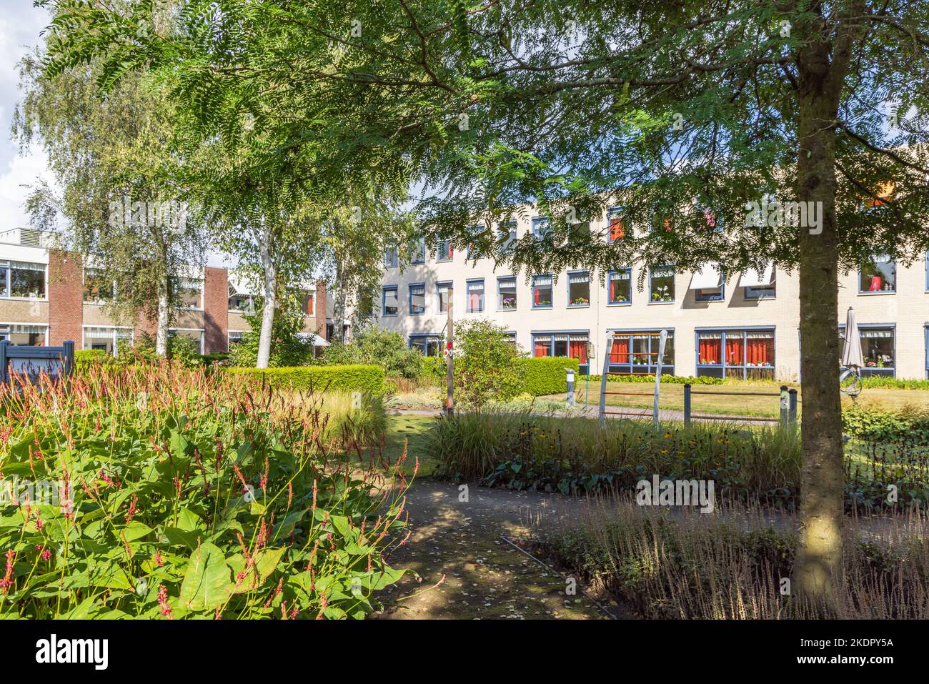 Leek, The Netherlands - September 10, 2022: Green and cozy garden of nursing home Vredewold in Leek, municipallity Westerkwartier Groningen province i Stock Photo
