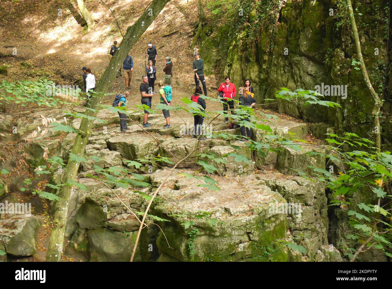 Walkers in the Gaja Gorge, Romai Furdo, the temporarily dried up Roman ...