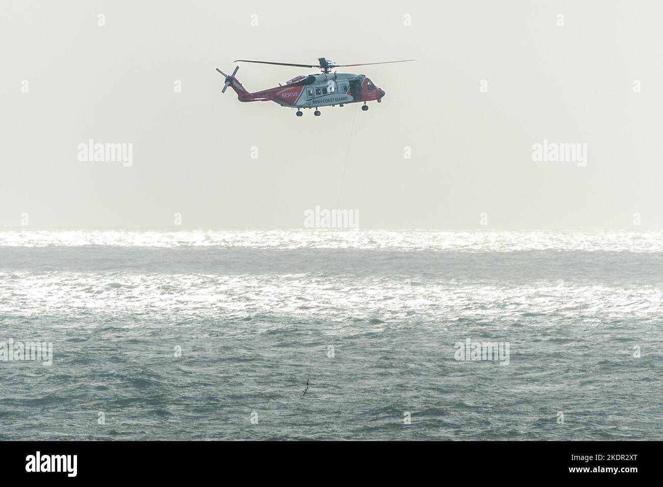 Tramore, Co. Waterford, Ireland. 8th Nov, 2022. The Irish Coastguard helicopter, Rescue 115, conducted a winching exercise in Tramore Bay this morning. The helicopter hovered for around 20 minutes during the exercise before flying back to its base at Waterford Airport. Credit: AG News/Alamy Live News Stock Photo
