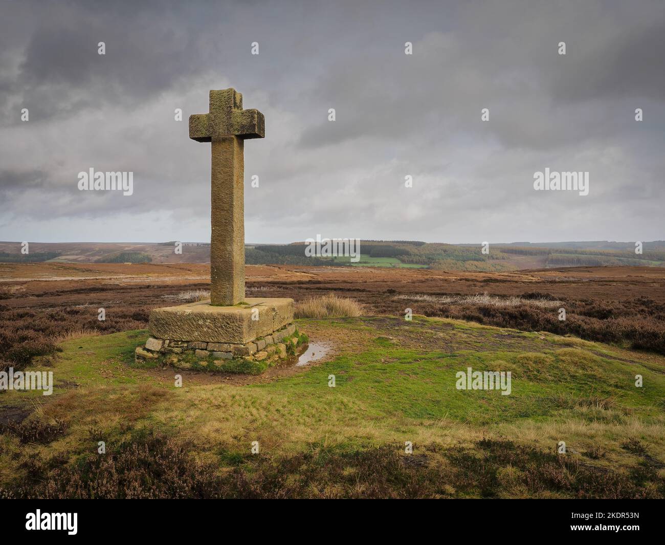 Ana Cross on top of Spaunton Moor overlooking Rosedale valley, North York Moors Stock Photo