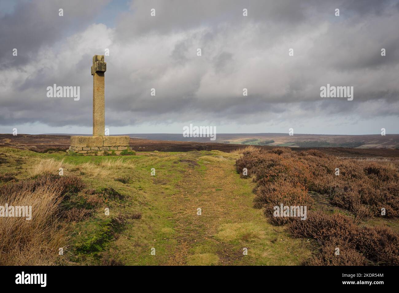 Ana Cross on top of Spaunton Moor overlooking Rosedale valley, North York Moors Stock Photo