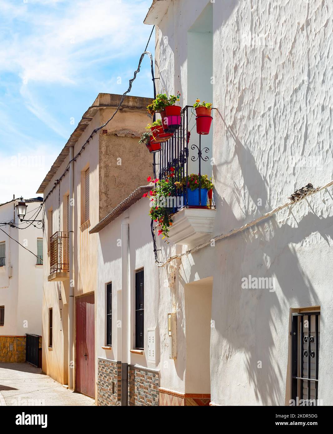 Old town street curve, white houses, traditional architecture, Darrical, Spain Stock Photo