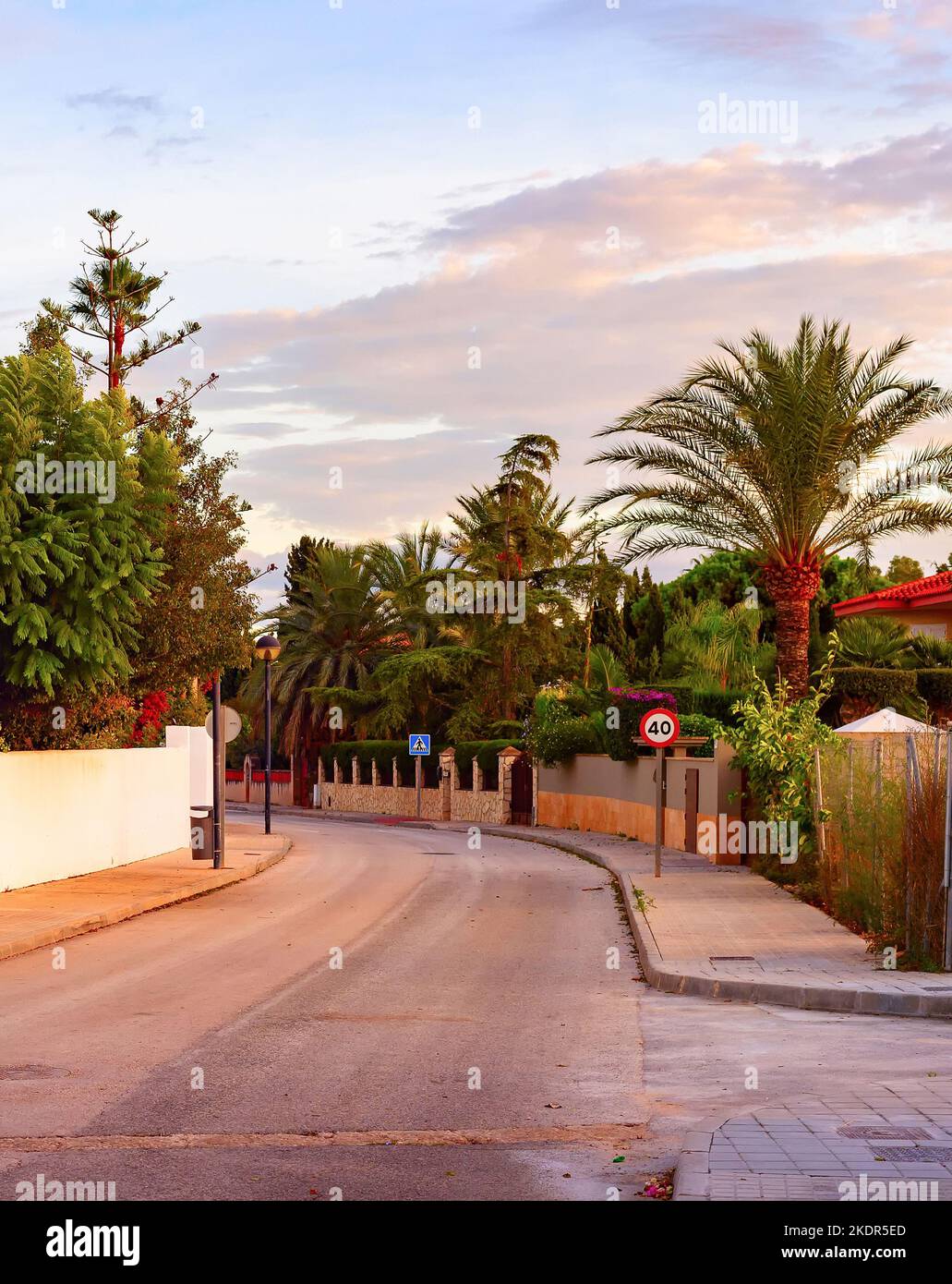 Evening street view in residential area with private houses, Alicante, Sapin Stock Photo