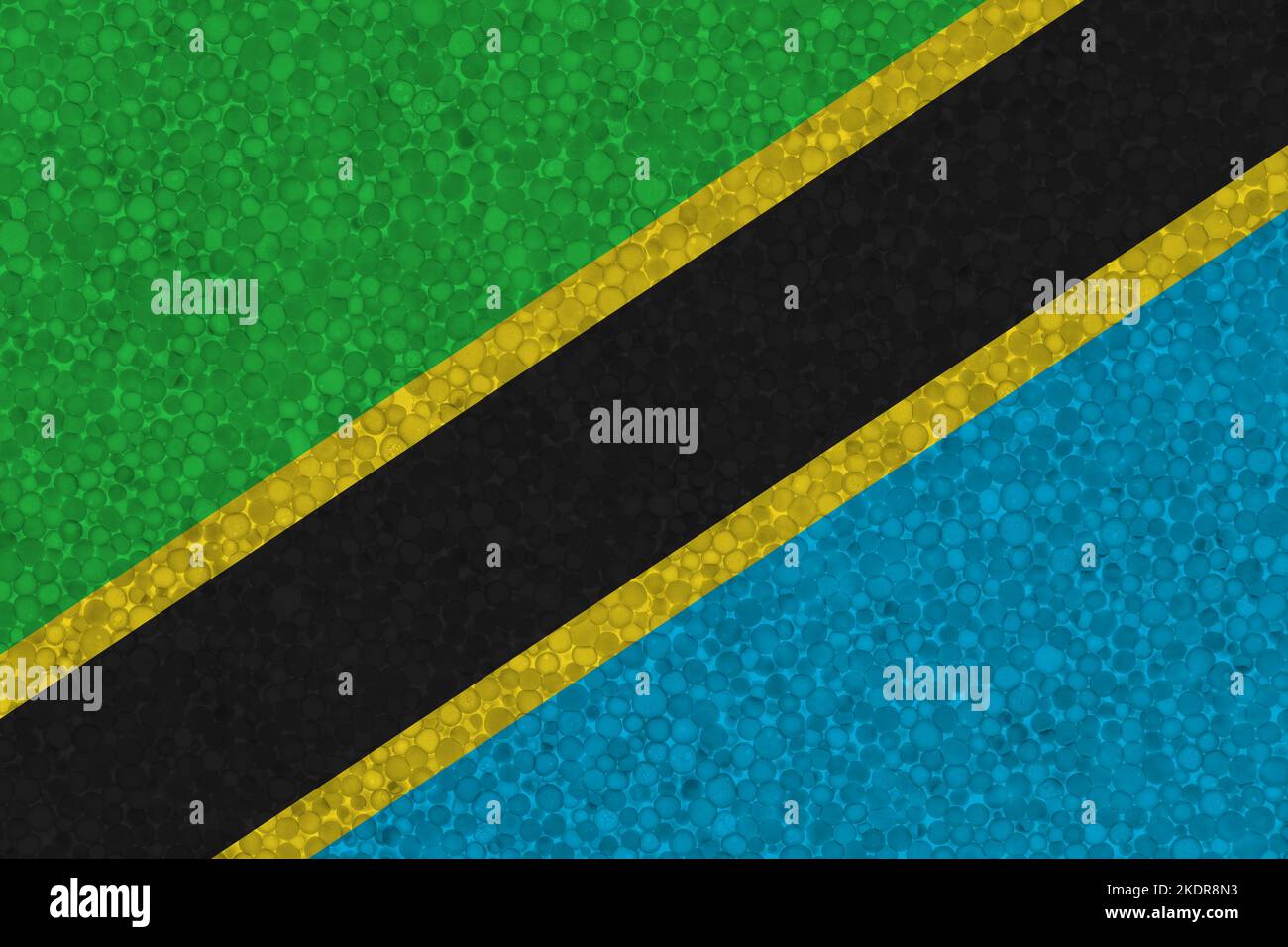 Flag of Tanzania on styrofoam texture. national flag painted on the surface of plastic foam Stock Photo