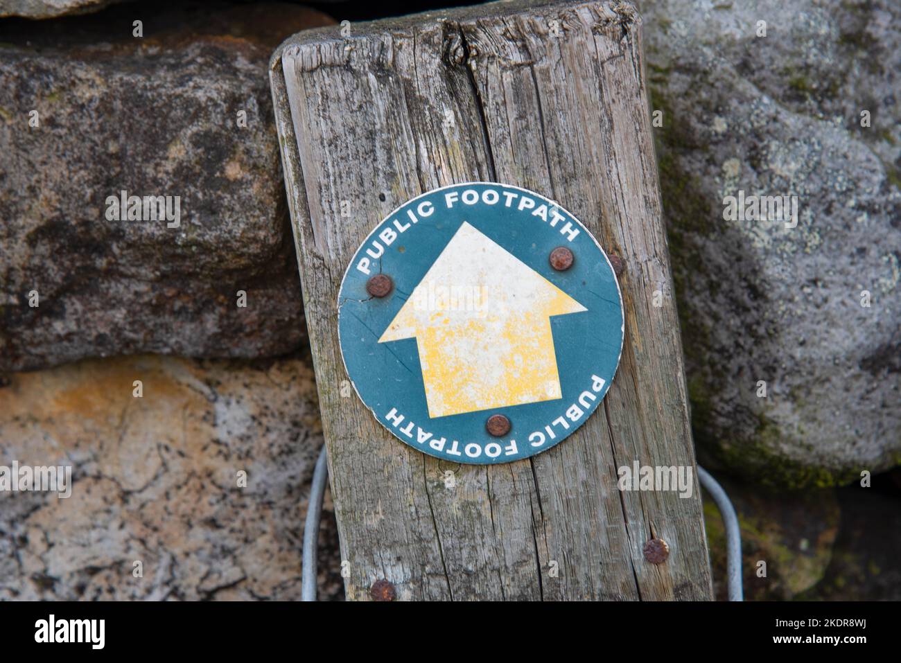 Wooden signpost "Public Footpath" in the Deepdale in the Yorkshire Dales in England, UK. Stock Photo