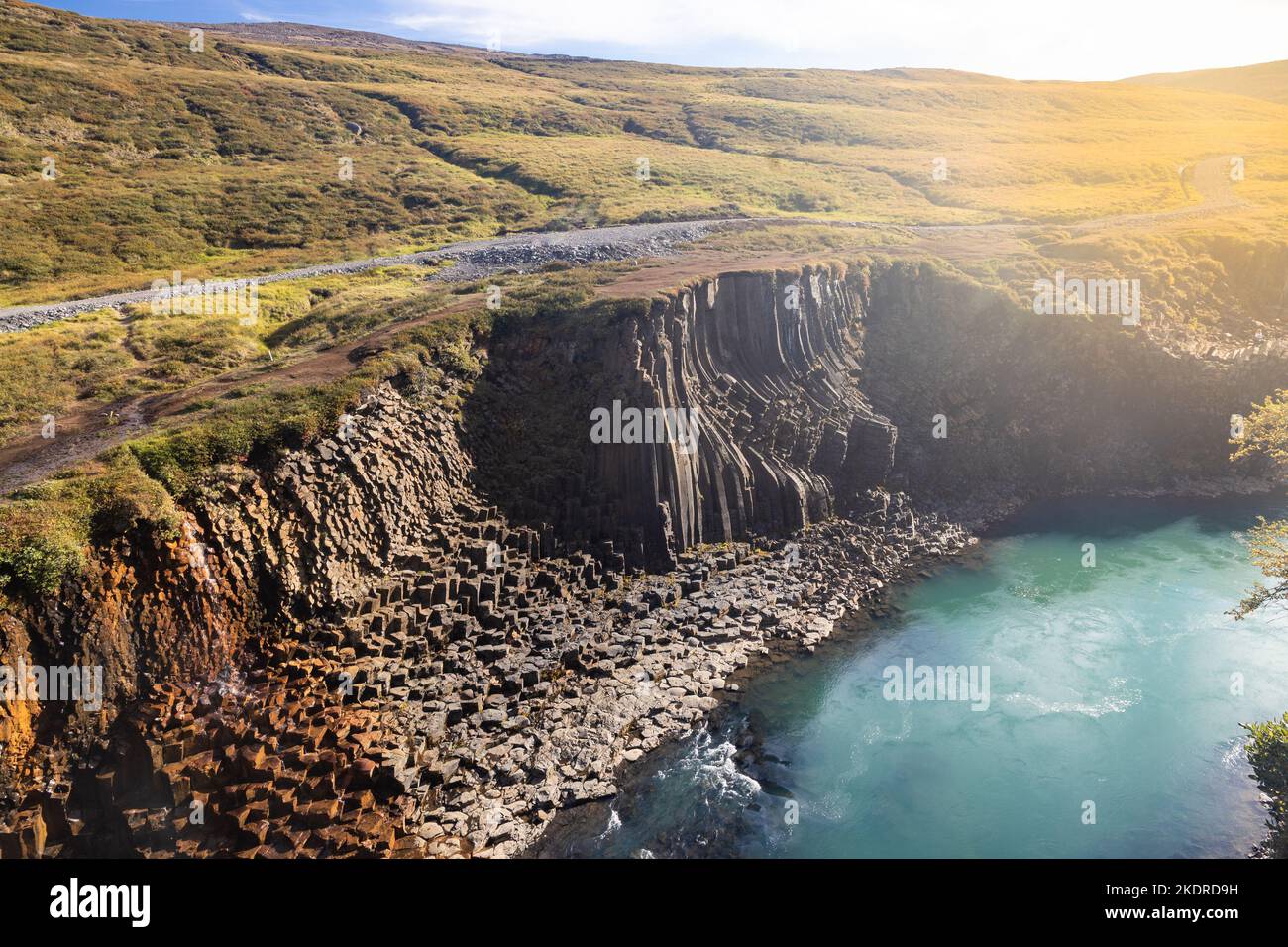 Closeup of Studlagil ravine in Jokuldalur Iceland, known for its columnar basalt rock formations and the blue-green water that runs through it. It Stock Photo
