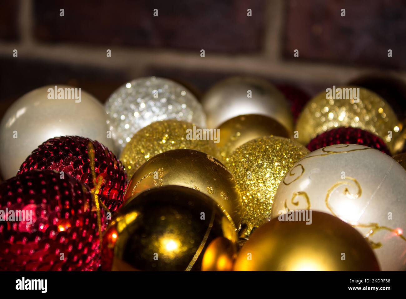 View over the top of various Christmas tree baubles Stock Photo Alamy