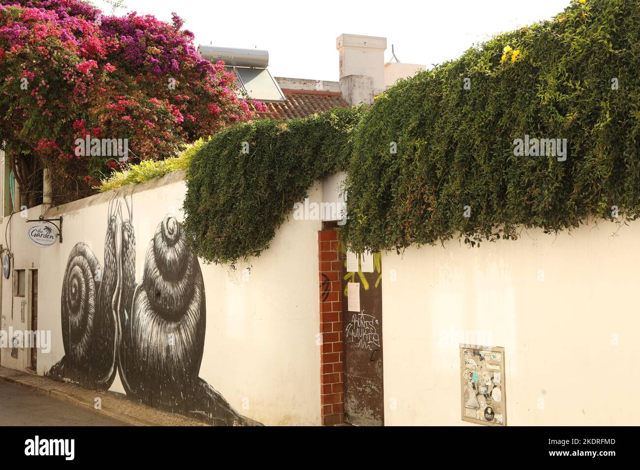 A mural of two snails on a wall in old town, Lagos, Algarve, Portugal Stock Photo